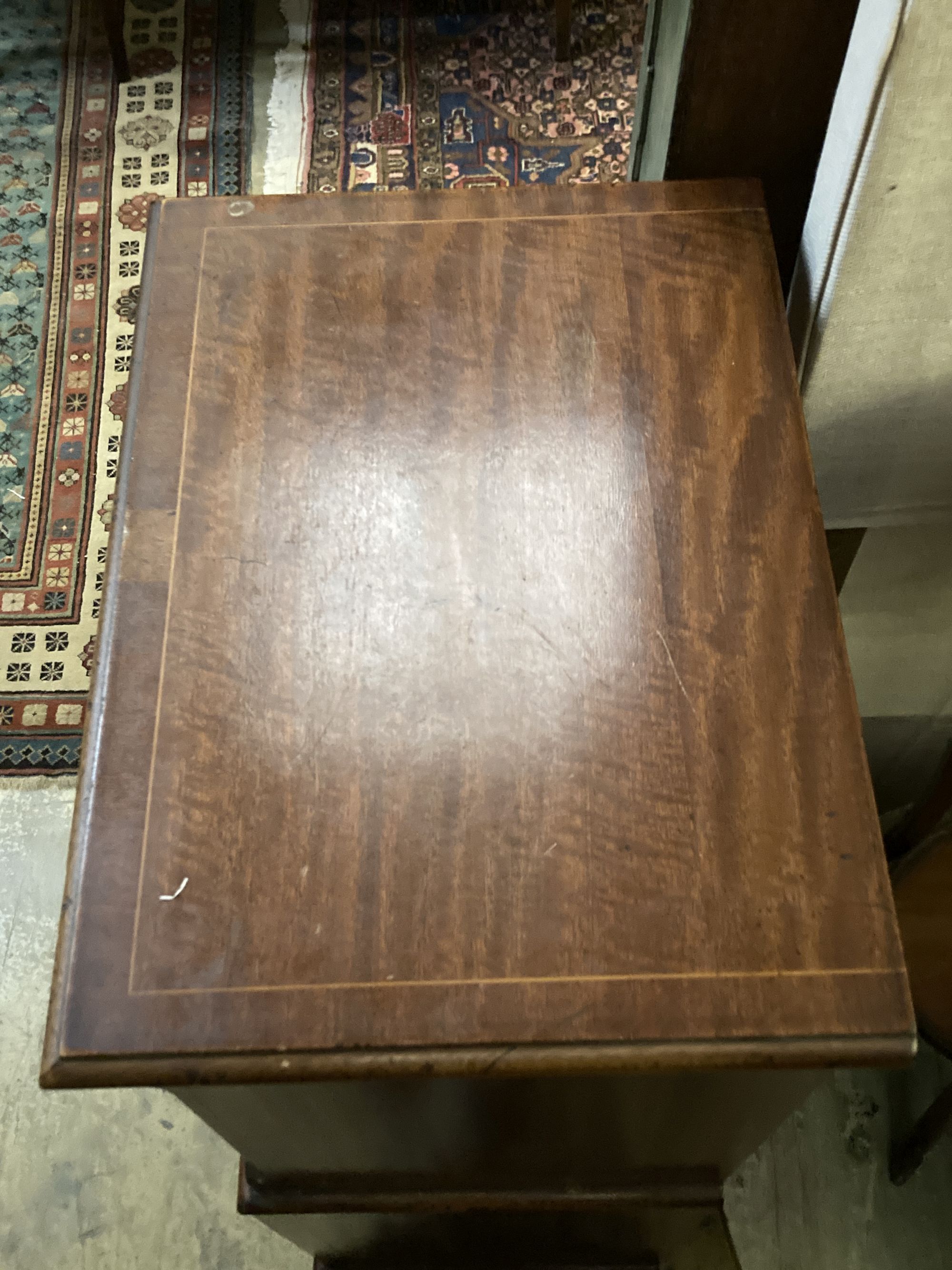 A small banded and inlaid mahogany tall chest of six long drawers, width 52cm depth 37cm height 115cm